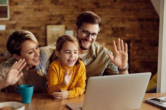 family using laptop